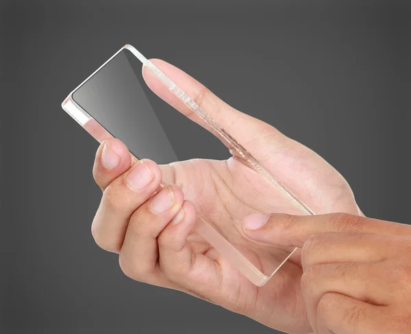 Hände halten futuristisches transparentes Mobiltelefon — Stockfoto