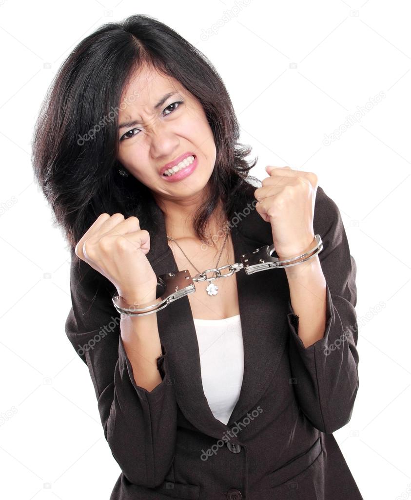 business woman in handcuffs
