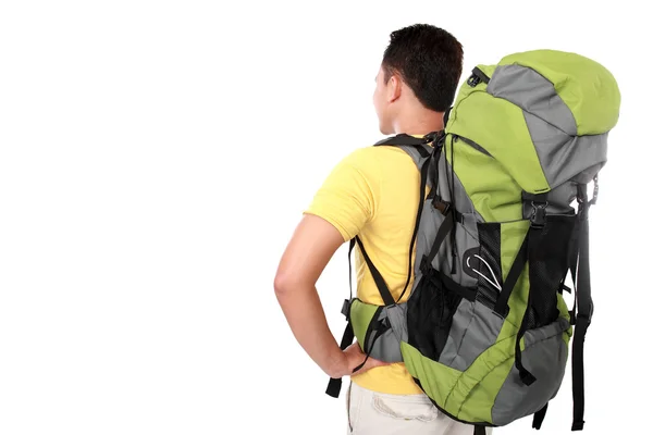 Portrait of young man backpacker from behind — Stock Photo, Image