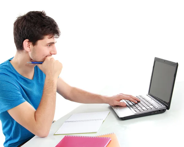 Estudante universitário usando seu laptop — Fotografia de Stock