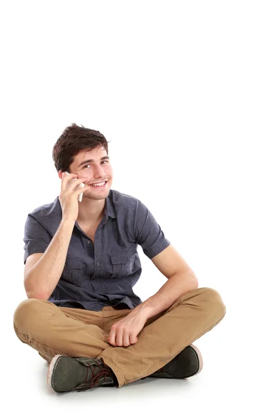 Casual ung man talar i telefon — Stockfoto