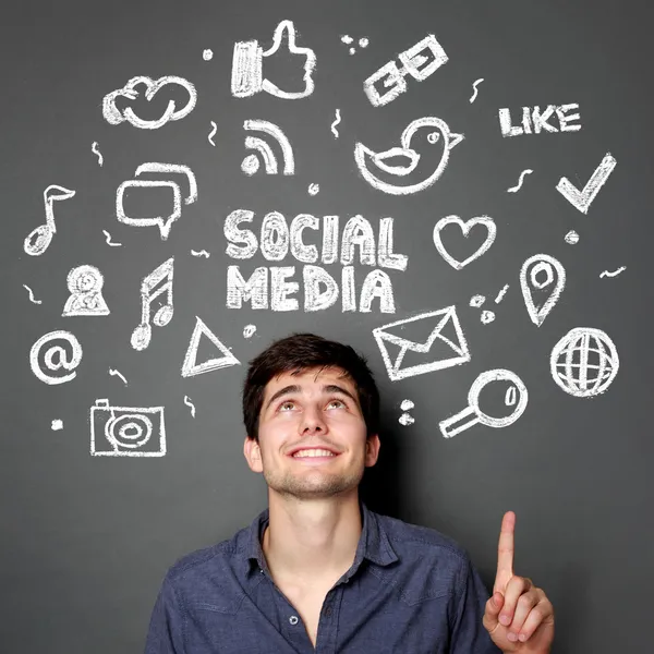 Man with Hand drawn illustration of social media concept — Stock Photo, Image