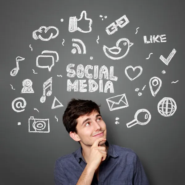 Man with Hand drawn illustration of social media concept — Stock Photo, Image