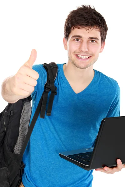 Junge männliche Studentin mit Laptop zeigt Daumen hoch — Stockfoto