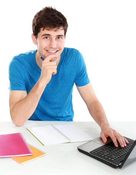 College student met behulp van zijn laptop — Stockfoto