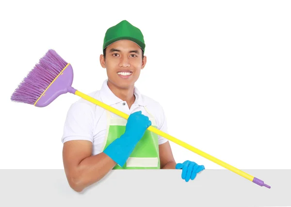 Portrait of young man ready to do some cleaning. presenting copy — Stock Photo, Image