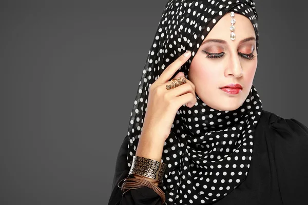 Fashion portrait of young beautiful muslim woman with black scar — Stock Photo, Image