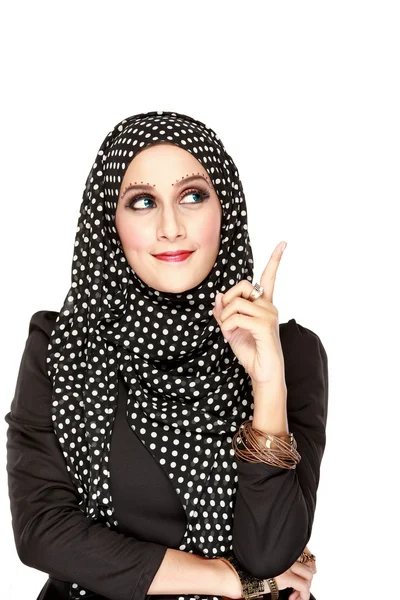 Woman with black scarf looking up to copy space — Stock Photo, Image