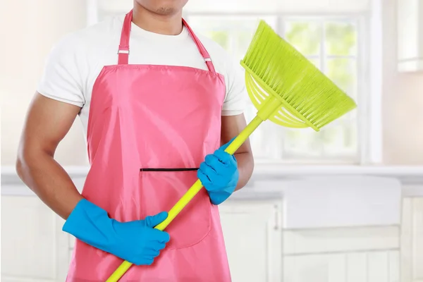 Man's body with broom cleaning equipment — Stock Photo, Image