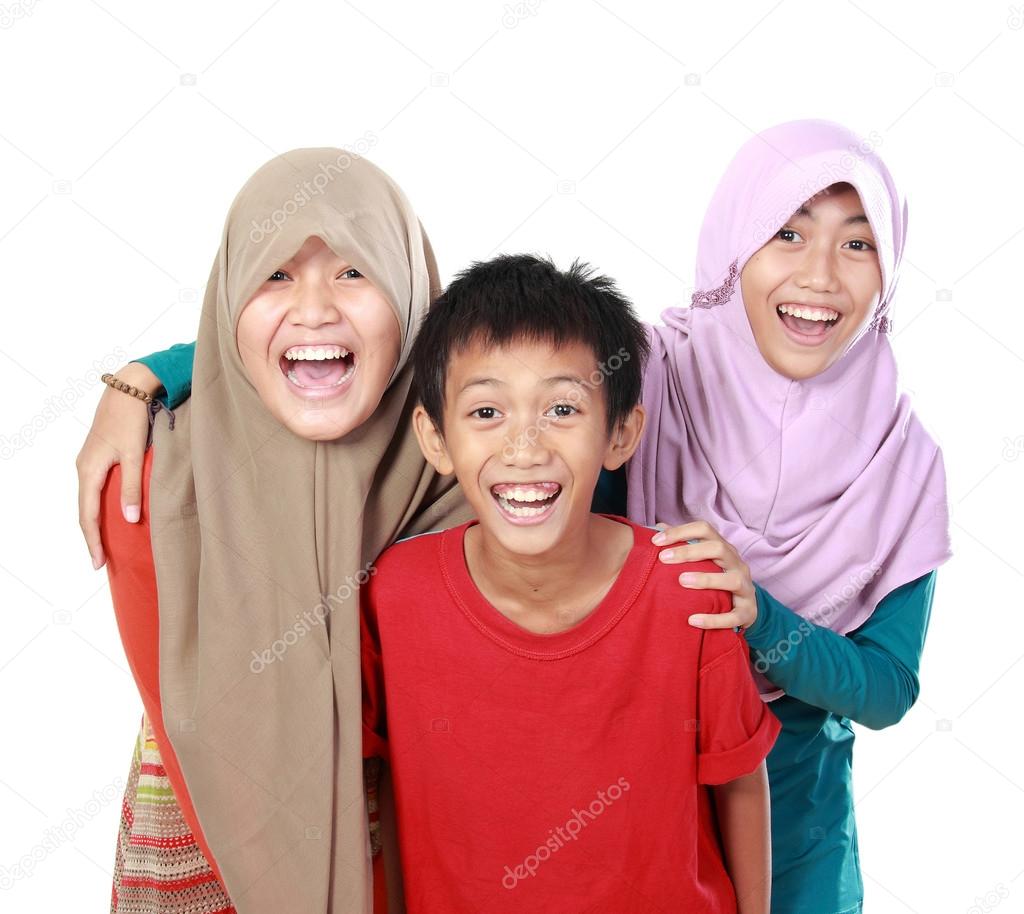 portrait of three kids  smiling