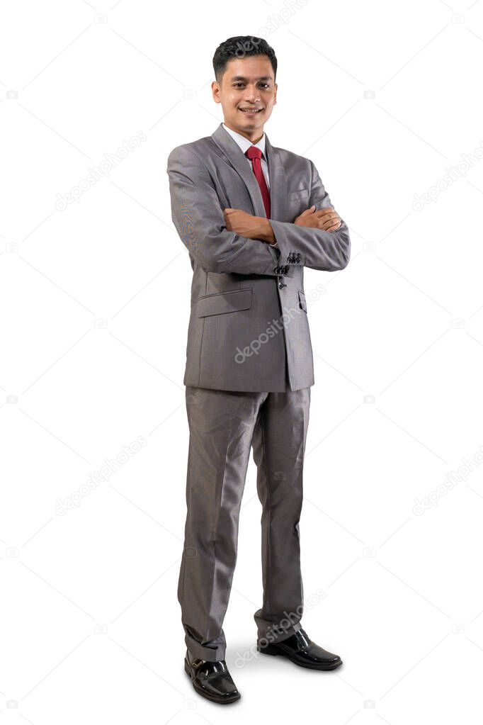 man in business suit crossed arm while standing