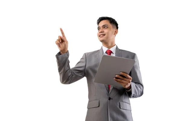 Geschäftsmann hält Tablet-PC isoliert über weißem Hintergrund — Stockfoto