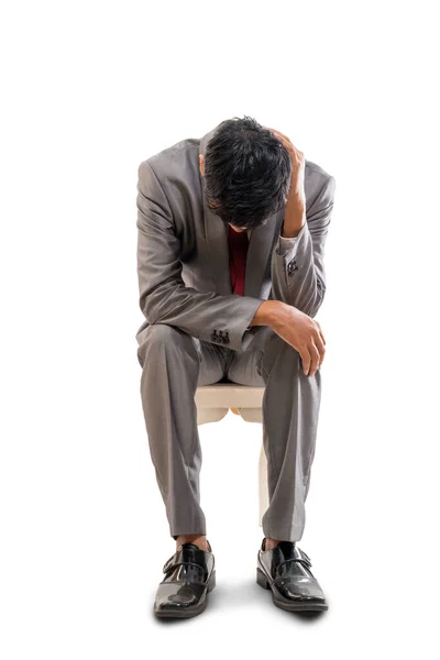 Affärsman i kostym stressad hålla huvudet — Stockfoto