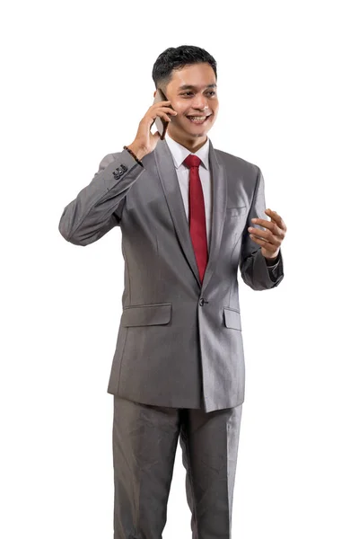 Asian young businessman using mobile smartphone on white — Stock Photo, Image