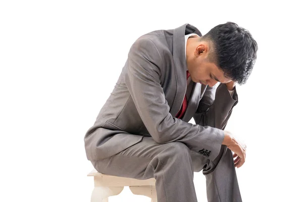 Businessman in his suit feeling stressed hold his head — Stock Photo, Image