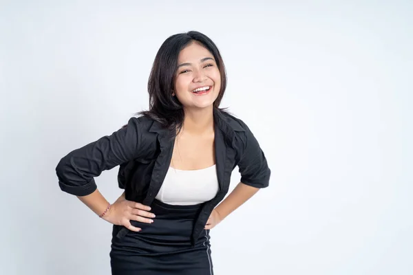 Young asian woman standing with hands on waist — Stock Photo, Image