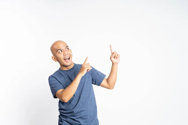 Bald man with finger gesture pointing up with blank spot — Stock Photo, Image