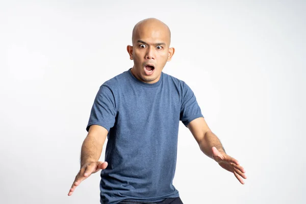 Bald man screaming with shocked hand gesture — Stock Photo, Image