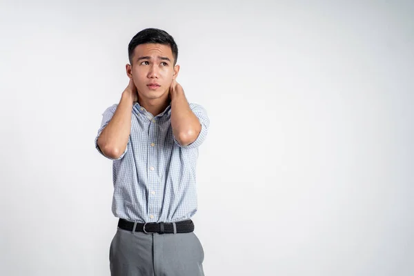 Stressad ung man från Asien känner sig osäker — Stockfoto