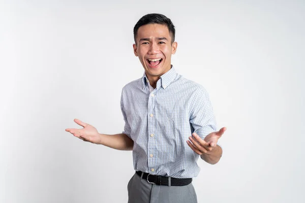 Excitado asiático joven hombre con dos manos apretado —  Fotos de Stock