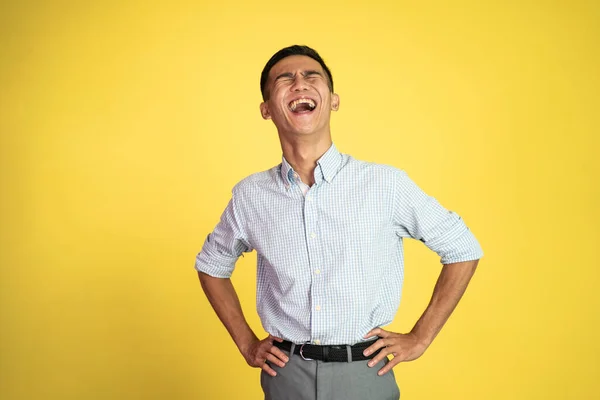 Asian businessman laughing naturally over isolated background — Stock Photo, Image