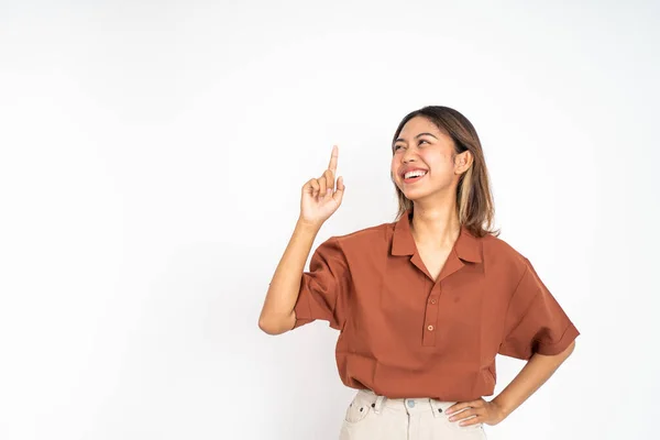 Woman with finger pointing up hand gesture on isolated background — Foto de Stock