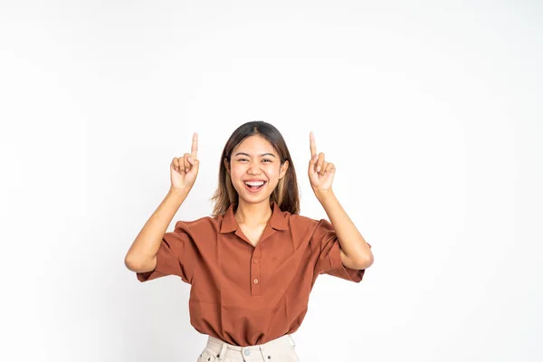 Woman with finger pointing up hand gesture on isolated background — Stock Photo, Image