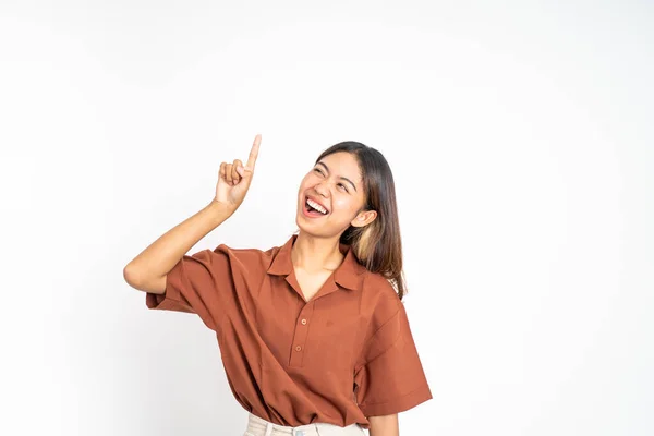 Woman with finger pointing up hand gesture on isolated background — Stock Fotó