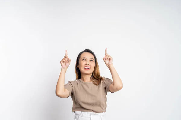 Woman with finger pointing up hand gesture on isolated background — Stock Photo, Image
