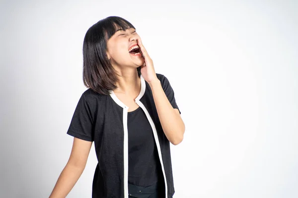 Excited beautiful woman feeling joy laughing on isolated background — Stok fotoğraf