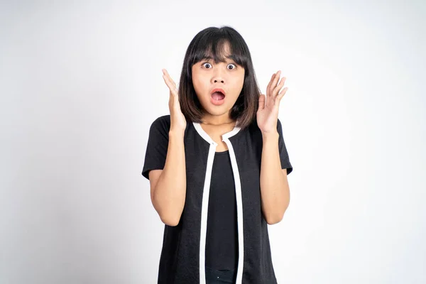 Woman feeling shocked and suprised over isolated background — ストック写真