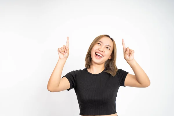 Woman with finger pointing up hand gesture on isolated background — ストック写真