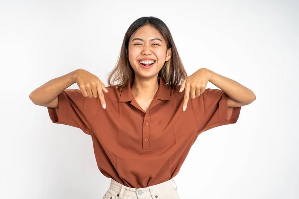 Woman with finger pointing down hand gesture on isolated — Stock fotografie