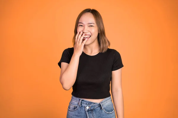 Excited beautiful woman feeling joy laughing on isolated background — Foto de Stock