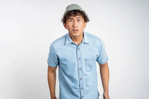 Asian man shocked expression standing over isolated background — Stock Photo, Image