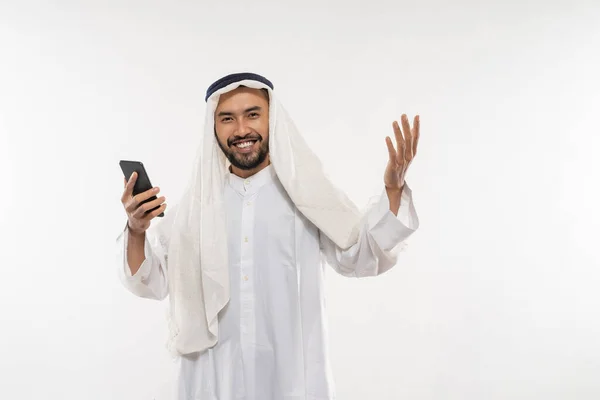Excited Young Man Turban Using Mobile Phone Happily Looking Screen — Zdjęcie stockowe