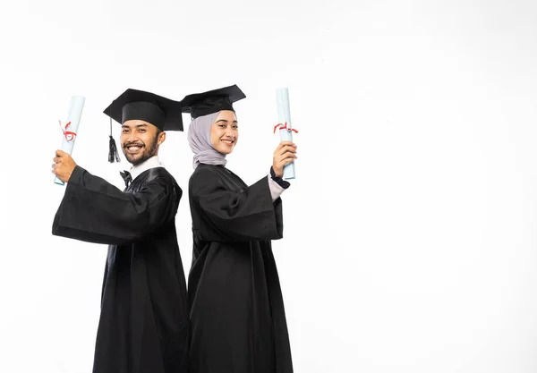 Happy Graduate Couple Black Toga Holding Rolls Certificate Isolated Background — Stok fotoğraf