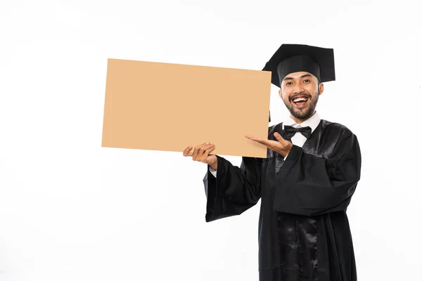 Excited Graduate Male Students Wearing Toga Holding Blank Space Carton — Stok fotoğraf