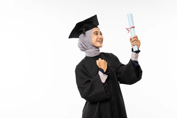 Excited Female Bachelor Graduate Wearing Toga Excitedly While Holding Certificate — Stok fotoğraf