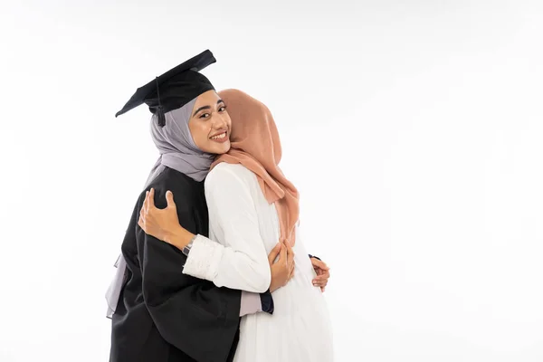 Happy Graduate Female Student Wearing Toga Meeting Her Friend Isolated — Φωτογραφία Αρχείου