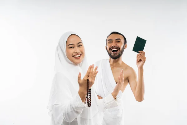 Happy Man Woman Wearing Ihram Clothes Holding Passport White Background — стоковое фото