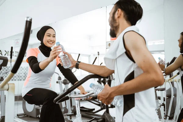 Muslim Couple Exercising Together Gym Having Bottle Water While Taking — 스톡 사진