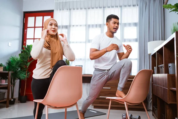 Modern Young Asian Couple Exercising Home Using Chair Help Them — Foto de Stock