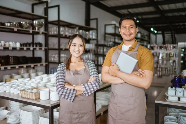 Two Shop Owners Apron Holding Digital Tablet Standing Hands Crossed — Stockfoto
