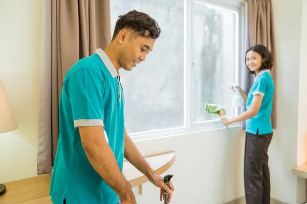 Two Housekeeper Turquoise Uniform Cleaning Window Floor Hotel Room — Φωτογραφία Αρχείου