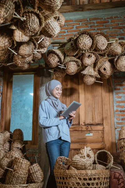 Female Entrepreneur Hijab Smiling While Using Tablet Home Door Craft — Stockfoto