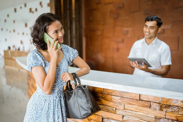 Asian Female Guest Calling Using Smartphone Receptionist Employee Background Using — Fotografia de Stock