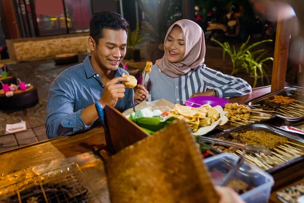 Happy Beautiful Muslim Couple Enjoying Having Dinner Out Traditional Food — Stockfoto