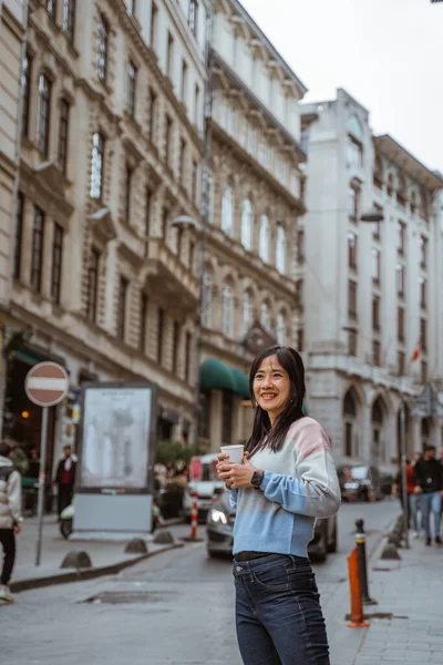 Woman Wearing Sweater Drinking Her Coffee While Standing City Centre — Foto de Stock