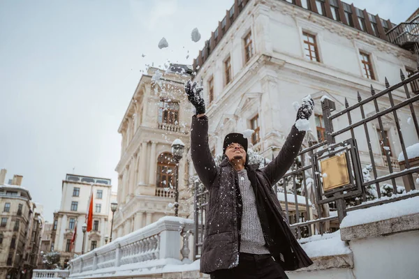 Happy Young Man Touching Snow First Time Visiting European Country — Stock Photo, Image